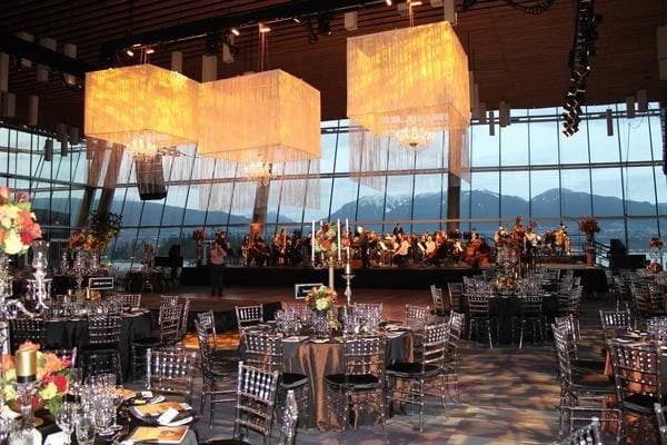 Gala tables at sunset with the mountains outside